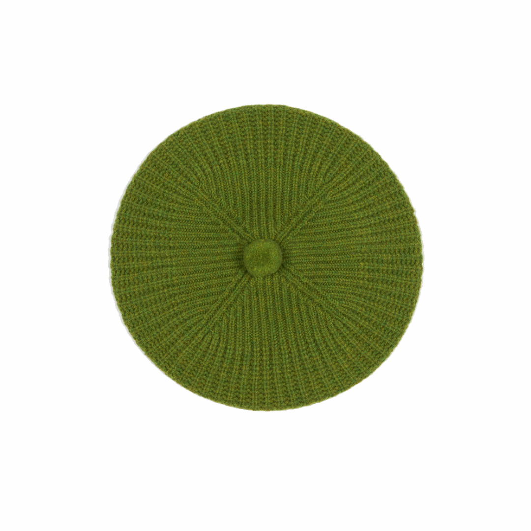 Green knitted beret on a white background