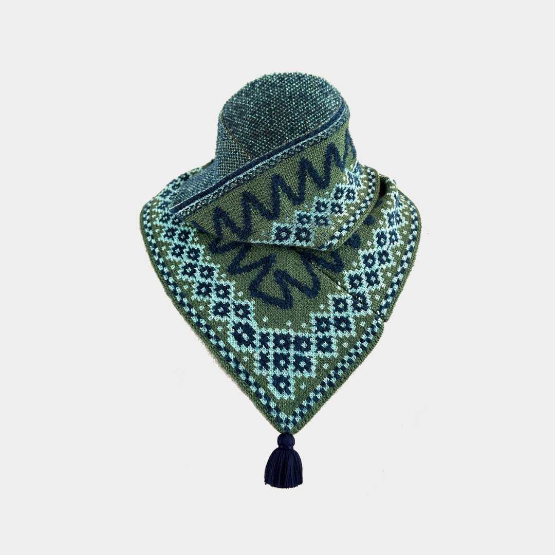 A green patterned knit bandana with a tassel, displayed on a neutral light gray background.