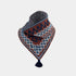A triangular knit bandana with a tassel, featuring a brown base with navy and white geometric patterns and a dark gray textured top edge, shown on a light gray background.