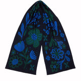 Dark blue scarf with blue and green floral patterns on a white background