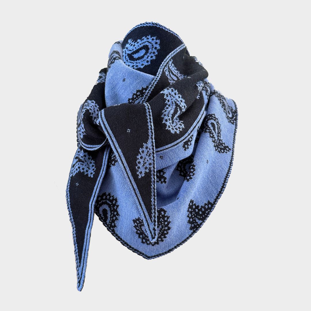 A light blue and black paisley bandana scarf, folded and displayed against a light gray background.