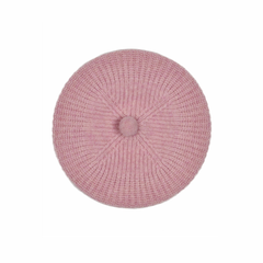 Pink knitted beret on a white background
