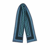 Blue and green patterned scarf on a white background