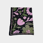 A square dark blue blanket featuring a vibrant floral pattern in pink and green, with a decorative striped border, displayed flat against a light gray background.