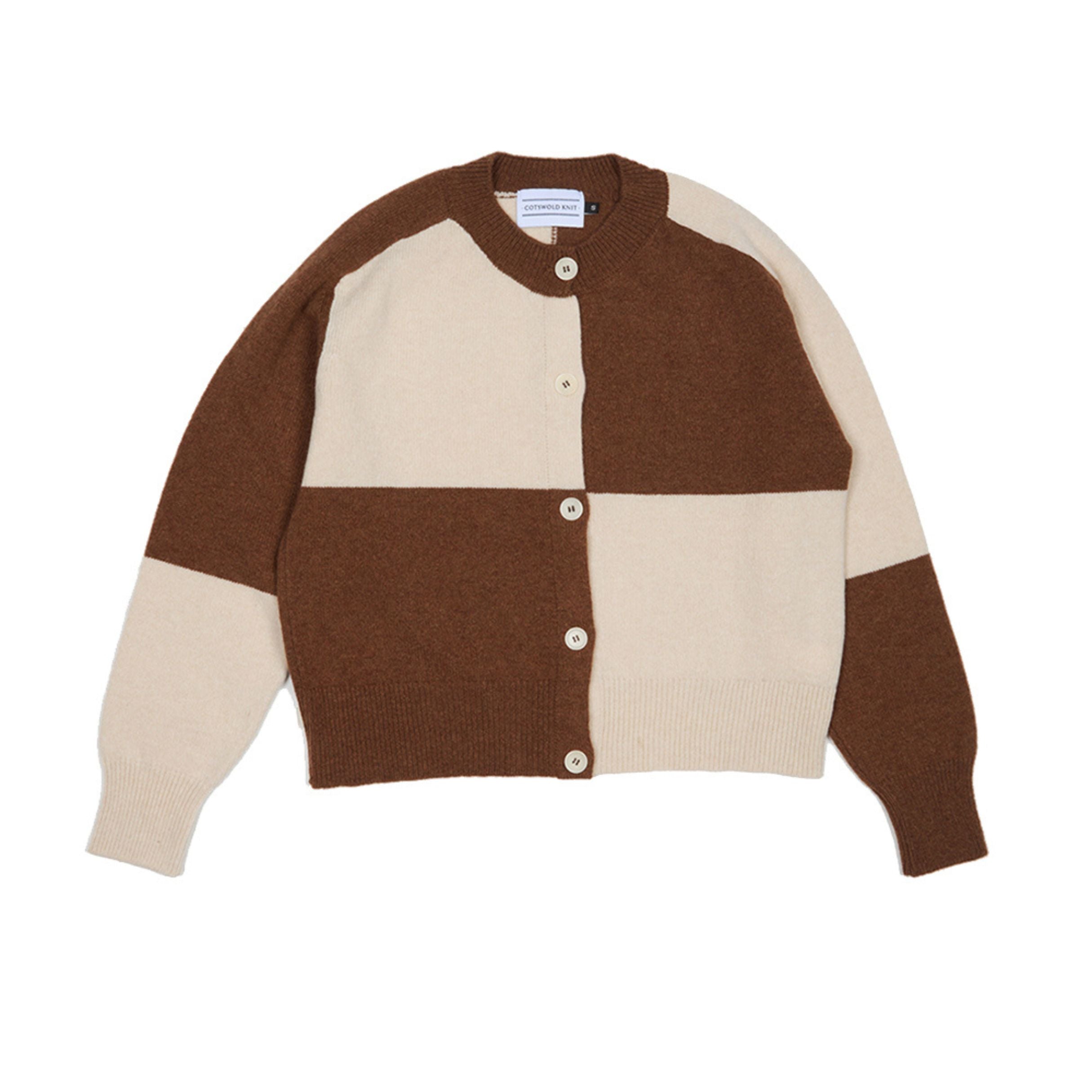 white and brown check cardigan with white buttons.