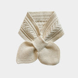 A cream-colored cable-knit scarf with a matching knitted wristlet or wristband, displayed on a light gray background.