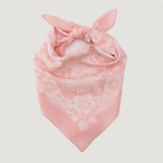 Pink floral bandana on a light gray background