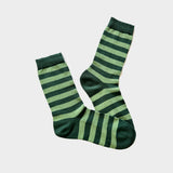 A pair of crew socks with horizontal stripes in dark forest green and light sage green, displayed against a light gray background.