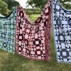 Cotswold Knit - 3 Burford Throws on washing line