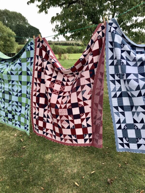 Cotswold Knit - 3 Burford Throws on washing line